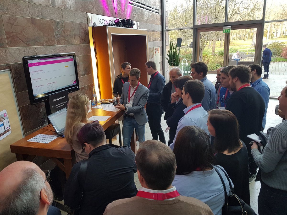 T_Digicamp's tweet photo. Tag 2 des Digic@mps in vollem Gange! 
Gerade sind die Teilnehmer im Austausch mit interessanten Digitalisierungsprojekten innerhalb und außerhalb der Telekom, bevor gleich Dr. Ferri Abolhassan mit seiner Keynote den Teilnehmern spannende Impulse liefert. #digicamp #telekomwall https://t.co/vjhFCwHh2o