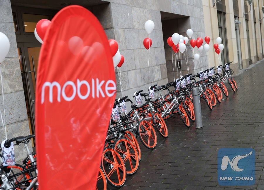 XHNews's tweet photo. Chinese bike-sharing company Mobike rides into German capital #Berlin.
In the 200th year since the #bicycle was invented by Karl Drais in Mannheim, #Germany, Mobike is celebrating it by launching 200th Mobike city in Berlin, the company says in a statement. https://t.co/CNksXisT9s