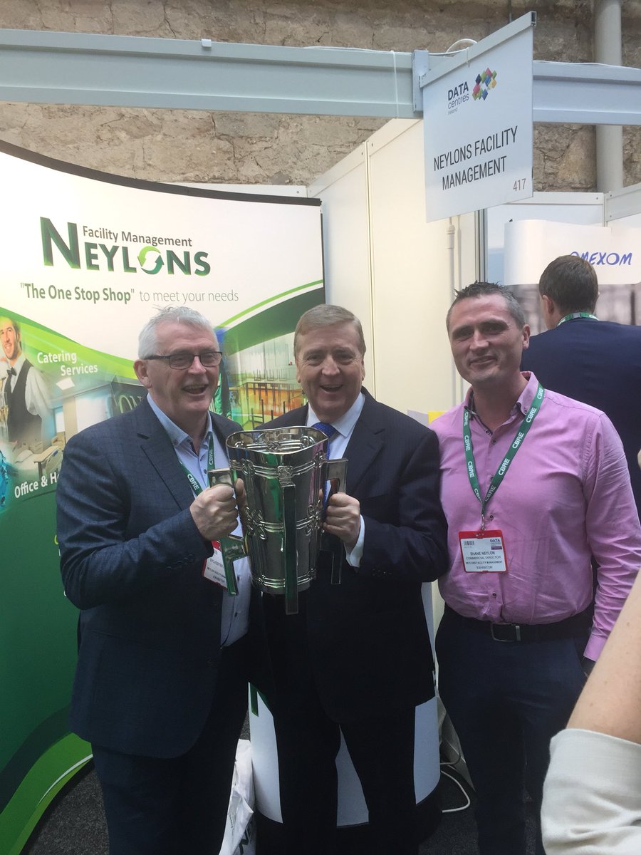 Looking forward to hearing Minister <a href="/PatBreen1/">Pat Breen</a> speak <a href="/datacentresire/">DataCentres Ireland</a> Pictured here holding Liam MacCarthy Cup <a href="/Neylons_FM/">Neylons</a> stand #417