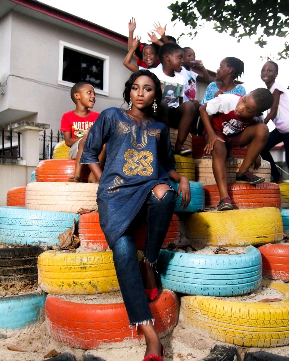 africafwl's tweet photo. Reposting @blingshiki: 

Love this image from #AFWL2017 designer and exhibitor @blingshiki 

Oh what a @throwback❤️ .. The photoshoot was on and the kids from the park joined in....What's free spirits children are💎 as Korede rocks the Blingshiki classic tunic in Denim series https://t.co/jY57OIqiDW