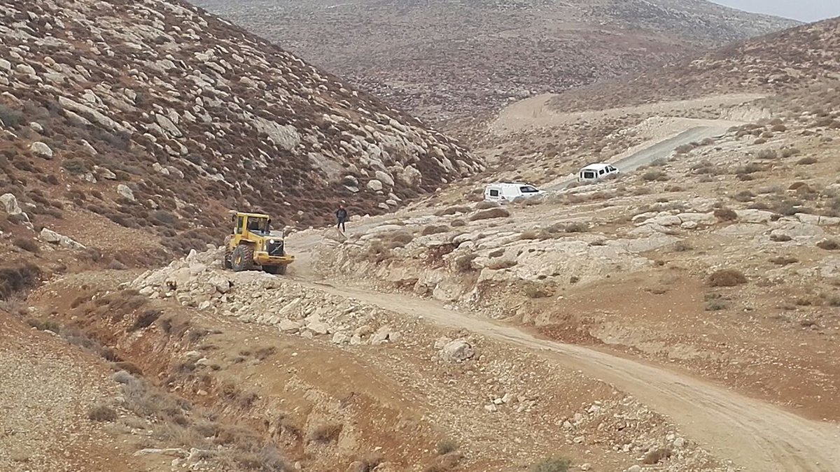 TogetherTuwani's tweet photo. Still #demolitions and #closures in #MassaferYatta #Firingzone918 Operation Dove volunteers are right now there. Israeli Army just demolished a srtucture in the village of #Halaweh. At the moment it's impossible to reach the village beacuse Army is closing the way with roadblocks https://t.co/DfQ52XAWv4