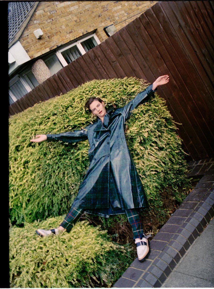 Sophie in a navy laminated tartan trench coat. The London Clan shot Ash Kingston for | Burberry | Scoopnest