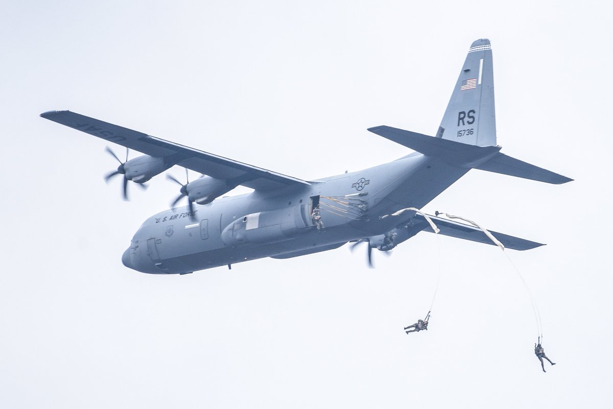 DeptofWar's tweet photo. Jump right into Monday like these @USArmy #paratroopers conducting an exercise over #Serbia. https://t.co/lux3QtSUFC