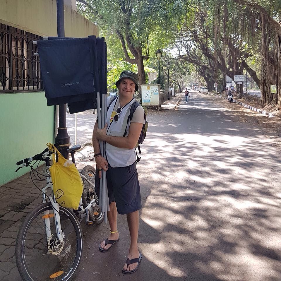 NickSayers's tweet photo. Goodbye Panjim! It was a blast running #CycleTheSolarSystem bike tours along the Miramar coast road with @DrAstroMeg. Back in the UK now, missing the heat and humidity of outer space. #TheStoryOfSpace @TheStoryOfFoundation #Goa #Panjim #flagboy https://t.co/keT8L6PyN0 https://t.co/q9CD46mXHn