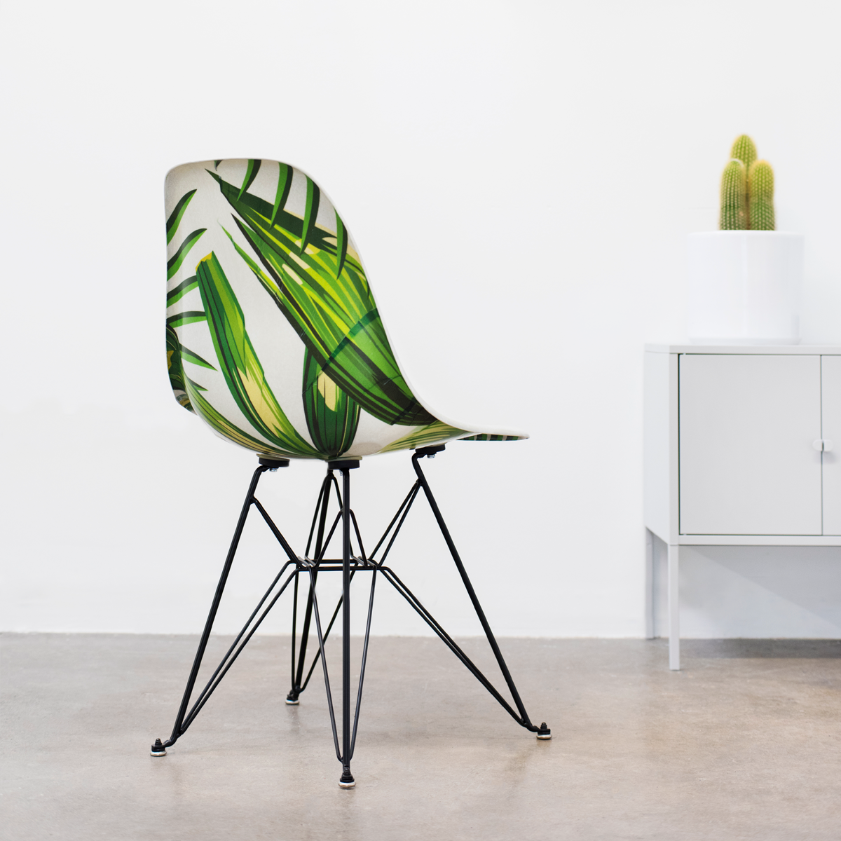 Modernica's tweet photo. Paradise on a chair! Introducing the Modernica x Garrett Leight Case Study® Side Shell Chair | Follow @GarrettLeight for more info on this exclusive collaboration. https://t.co/LTjodFBko9