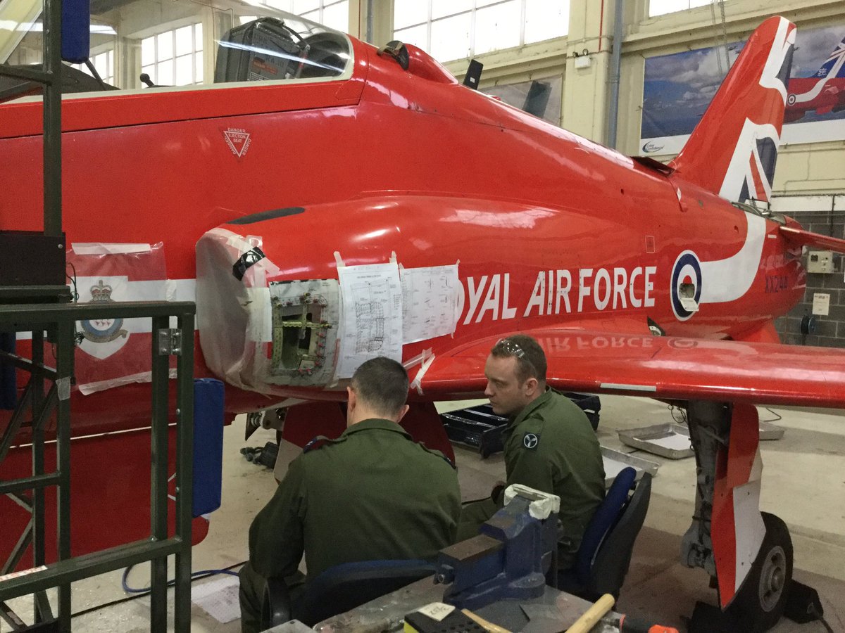 RAF_Wittering's tweet photo. 71 (IR) Sqn technicians repair Red Arrows Hawk at RAF Scampton #NoOrdinaryJob #STEM https://t.co/NMlYTpYATu https://t.co/fwVlfmeW22