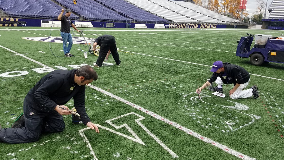 dan__erickson's tweet photo. Apple Cup logos being painted by our tremendous @UWGroundsCrew and painters https://t.co/oIag2NM2zY