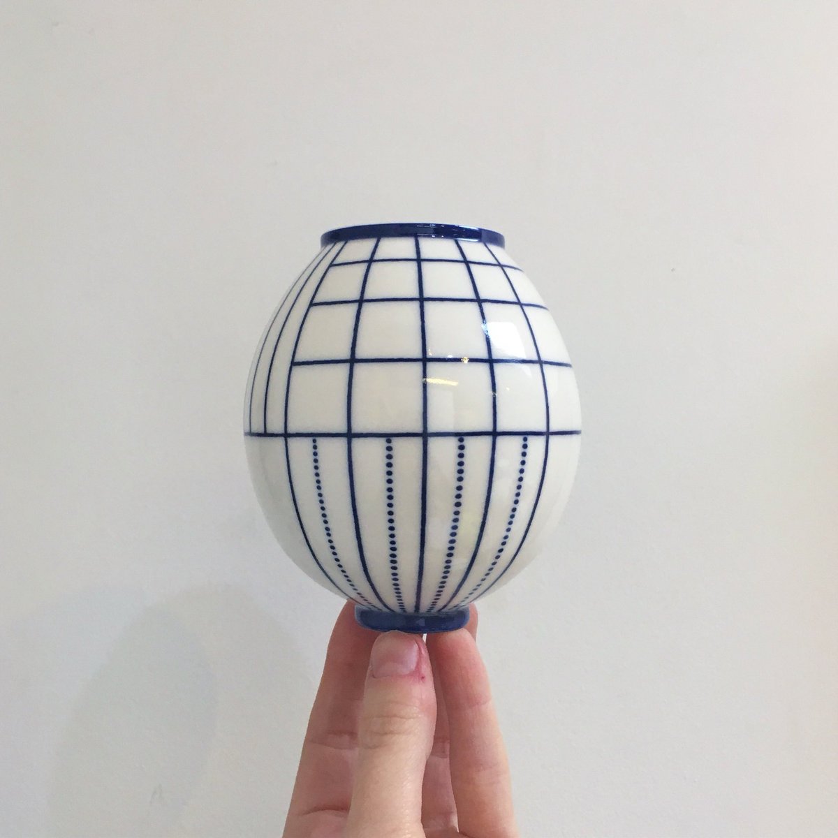 Moon jar on it’s way to <a href="/snug_gallery/">snug gallery</a>... it’s my first piece combining dots &amp; lines 🌚🌜🌝 #ceramics #moonjar #porcelain