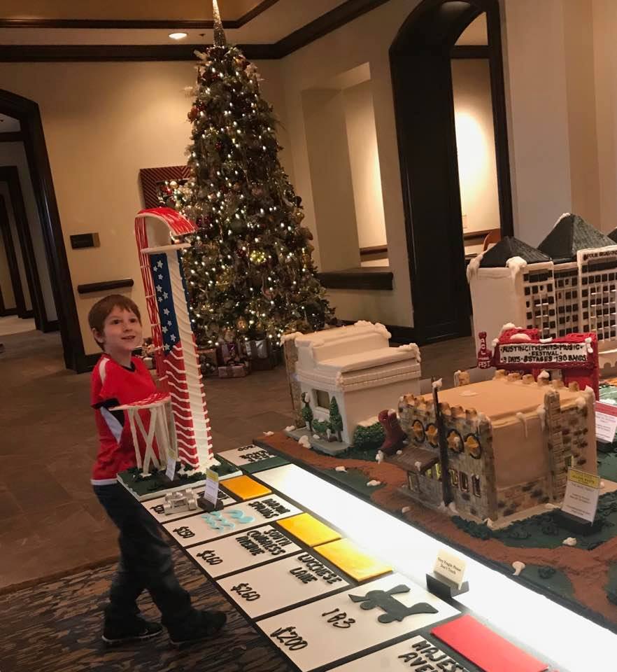 sdefesche's tweet photo. Sherri Defesche & grandson Bentley Goldin @ the Austin Four Seasons Hotel gingerbread village. Valet attendant allowed me to park my car in front of hotel for 10 minutes so we could conveniently pop in and see the display. Warmest hospitality! #FSGingerbread https://t.co/zCxGG6kHs0