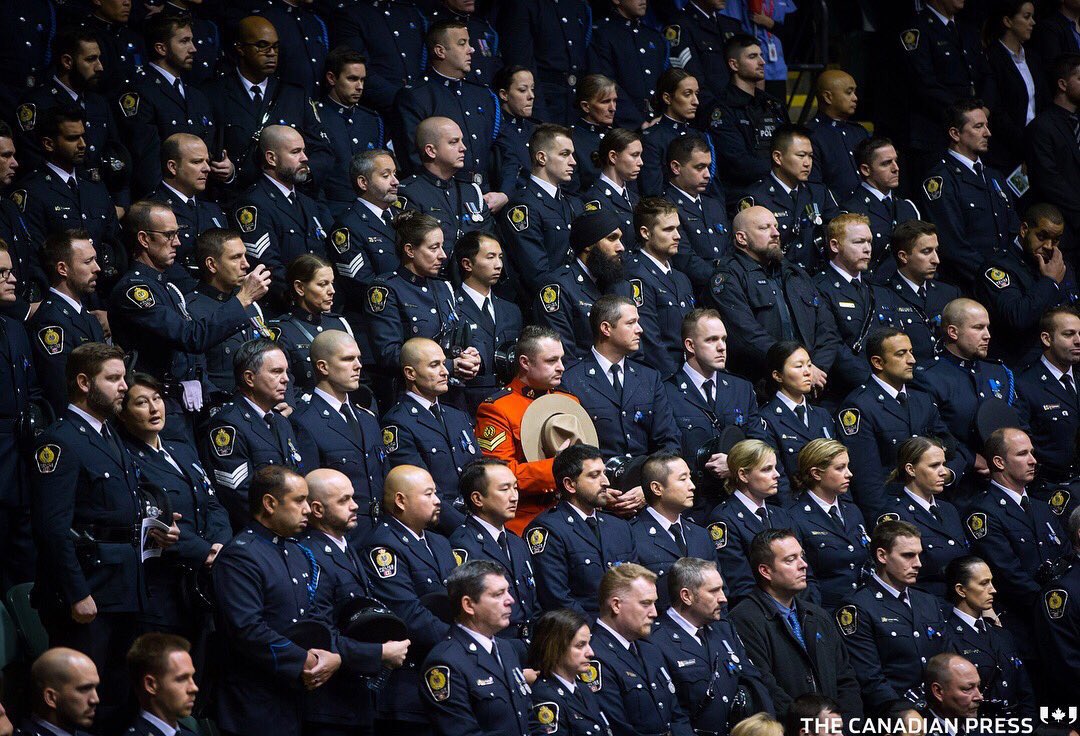 This is a special photo to our police academy class from Cst 386 John Davidson’s memorial - John was our classmate. The RCMP Officer standing with our class was one of our classmates (he later transferred).  Regardless of our uniforms, we will always #StandTogether. #AbbyPD #Hero