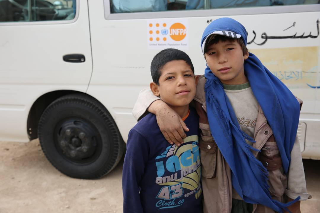 max_f_diana's tweet photo. In #Jibreen, east #Aleppo IDP shelter, waiting for mother who is availing of #womenhealth services provided by @UnfpaSyria partner #SFPA https://t.co/fu0Y4X1lQr