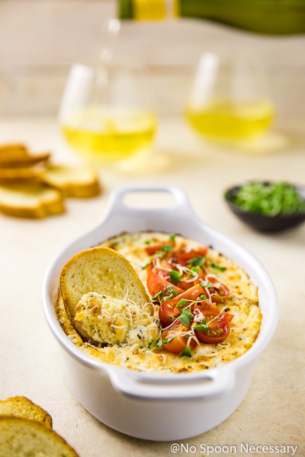 HonestCooking's tweet photo. A guest at someone else's #Thanksgiving? Show up with this app & a bottle of @sonomacutrer Chardonnay & your IN. https://t.co/Q4BNQxUUfm - #adPerfect Appetizer w/ Chardonnay: Baked Sun-Dried Tomato & Goat Cheese Dip @NoSpoonNecesary #21andup https://t.co/5tIxt69R78
