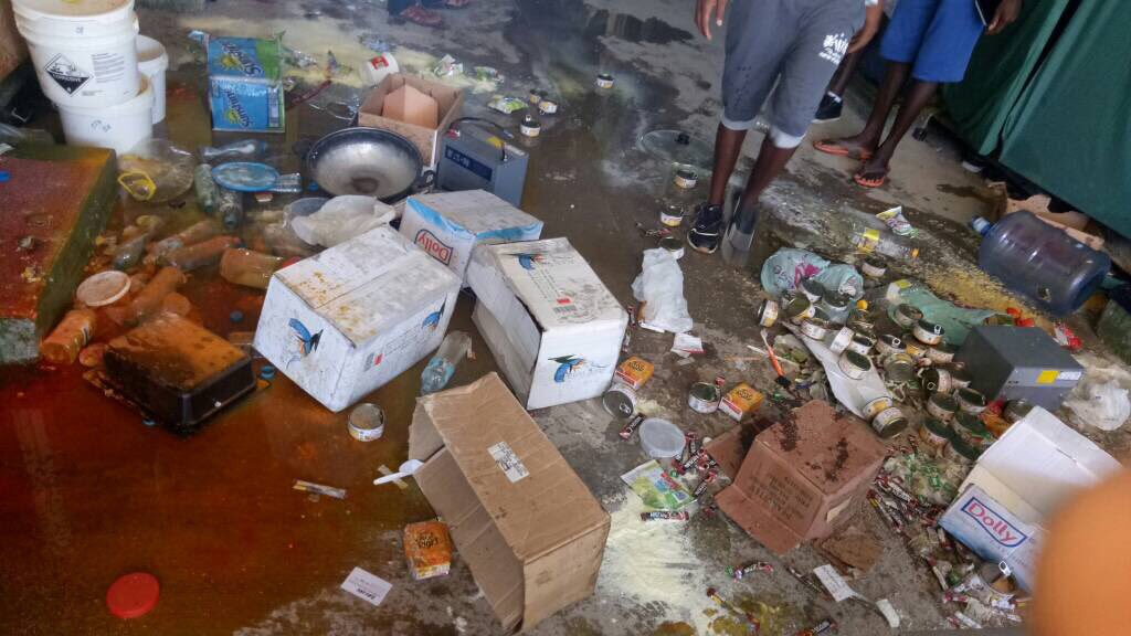 Just sent these photos of donated food supplies, smuggled in by local churches, destroyed by military minutes ago. #Manus