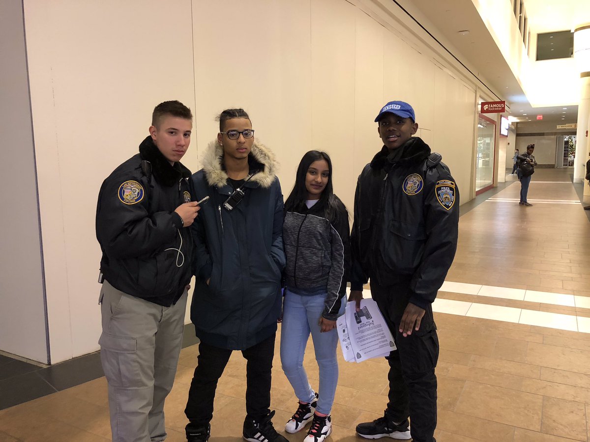 NYPD45Pct's tweet photo. #45Pct Explorers in #BayPlaza mall giving out safety tips for the upcoming holiday season. #CrimePrevention https://t.co/hw4r9ZBjGD