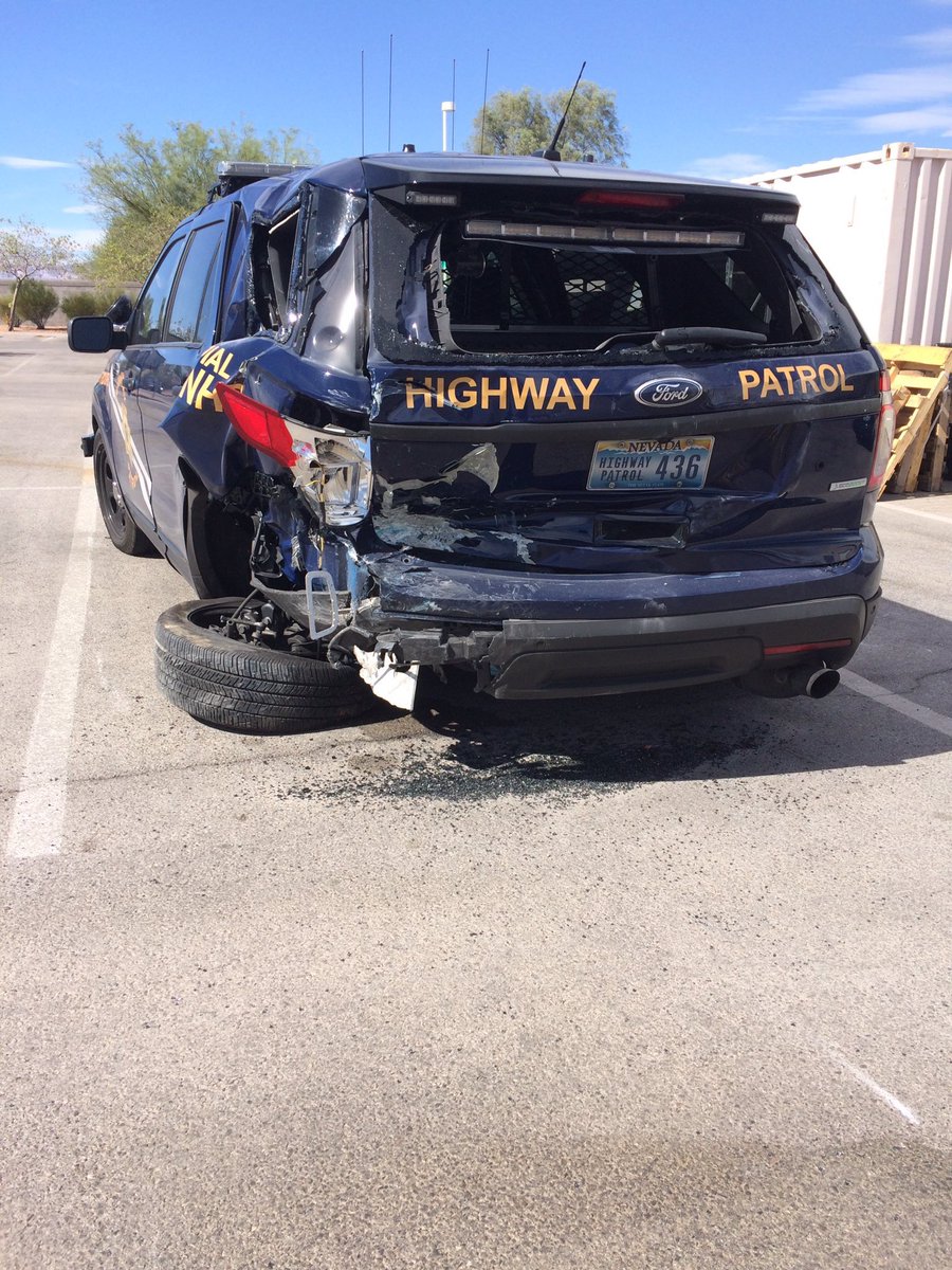 IT'S THE LAW IN NEVADA Move over 1 lane or slow down for stopped