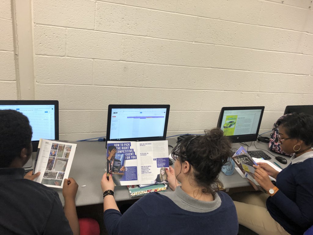 #DECAmonth Day 22: Our members reading the latest issue of DECA Direct!