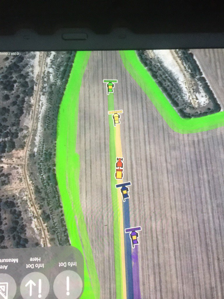 Tag team on #agritrac. Pulling off some faba beans with strong southerly blowing.