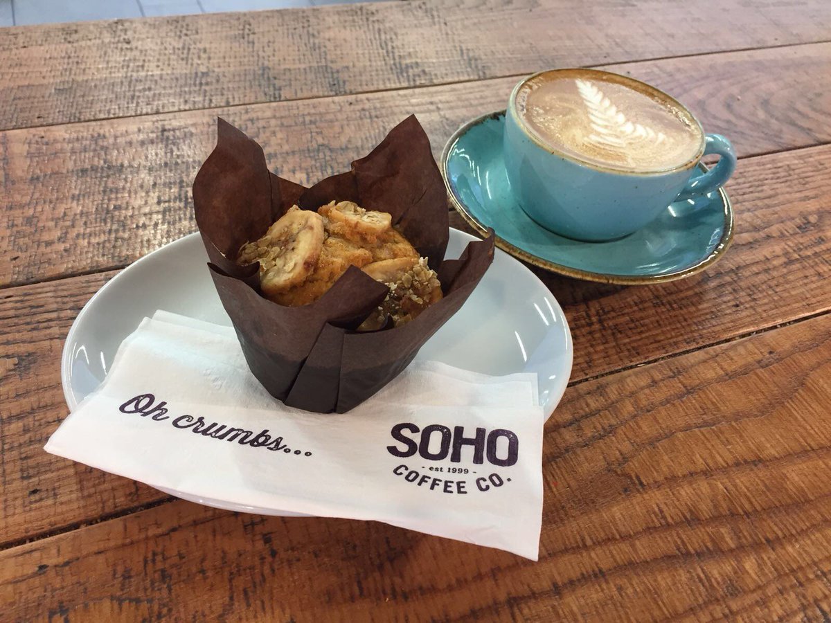 SOHO_Coffee_'s tweet photo. #HelloThursday! We're hiding from the cold today with a latte & banana bread muffin #HowaPeeling 🍌😍 https://t.co/KT8QQYFhJE