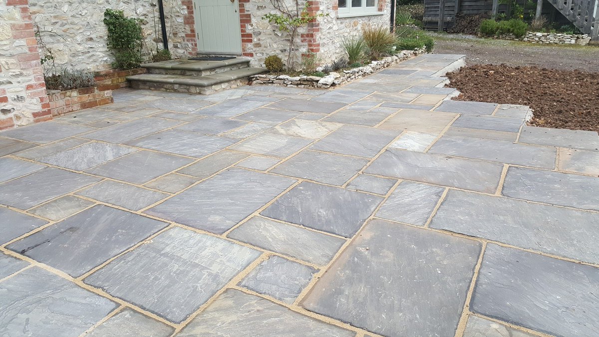 Westcrete's tweet photo. Great work once again by PH Landscaping who has expertly laid 61sq. metres of Sagar Black Indian Sandstone at a recent project in Wambrook, Somerset. 😍👏👏 #PatioPorn #landscapers #PavingProject #Gardenscapes #gardenshour #landscapephotography #Patio #gardening #sandstone https://t.co/z2cT3vQ5yv
