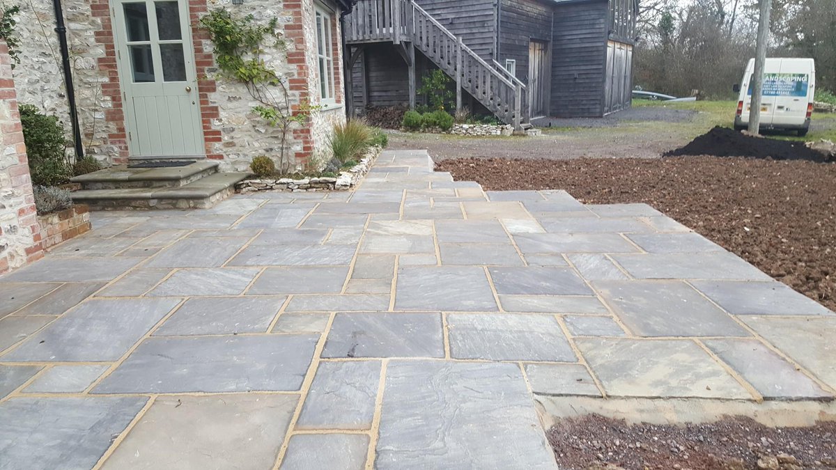 Westcrete's tweet photo. Great work once again by PH Landscaping who has expertly laid 61sq. metres of Sagar Black Indian Sandstone at a recent project in Wambrook, Somerset. 😍👏👏 #PatioPorn #landscapers #PavingProject #Gardenscapes #gardenshour #landscapephotography #Patio #gardening #sandstone https://t.co/z2cT3vQ5yv