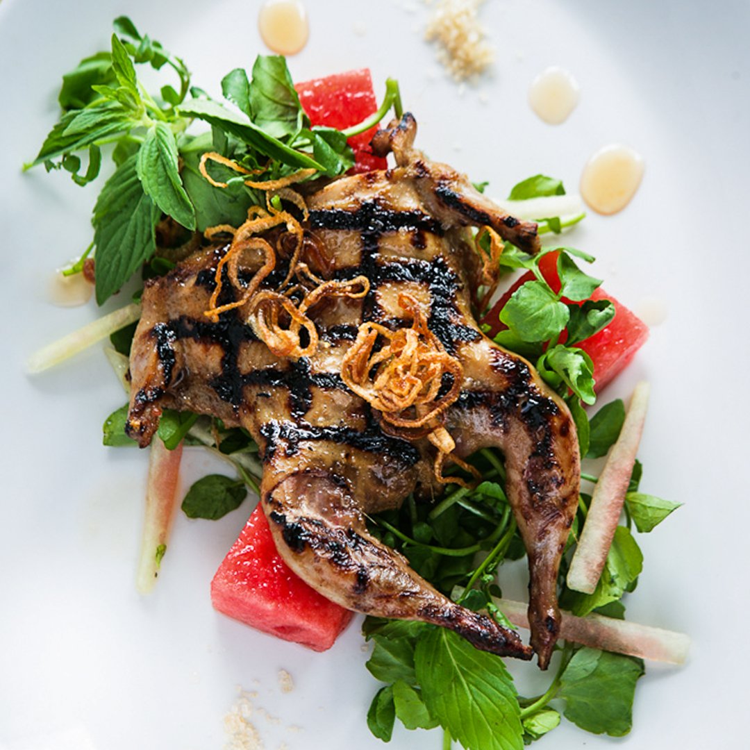 BBQ quail basted in hoi sin with a watercress, watermelon and spearmint salad.