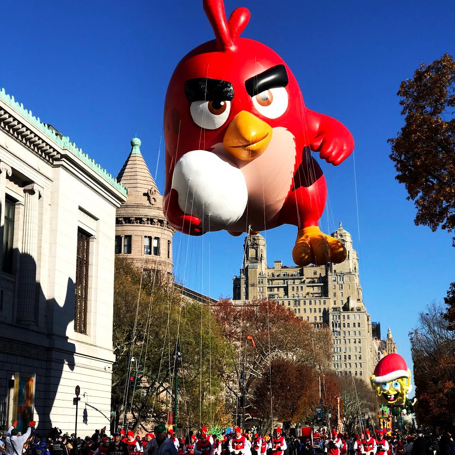Macys's tweet photo. Here comes Red — watch out piggies! 🐷 #MacysParade https://t.co/kjfvzlsGAT