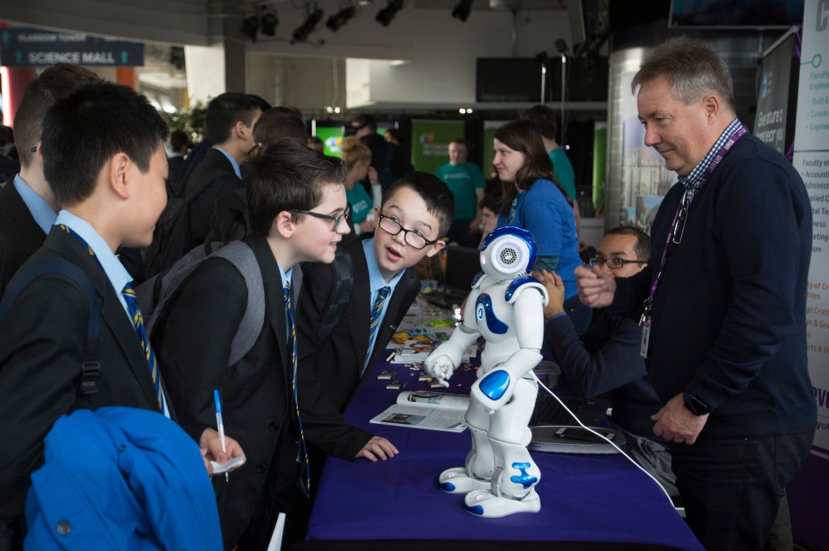 DigitalWorldHQ's tweet photo. We had such a great time @STEMGlasgow's #STEMfest2017 @gsc1 Thanks to @CofGCollege for brining along their cool robot who can do tai chi! #tbt https://t.co/gJ6oy9blvz