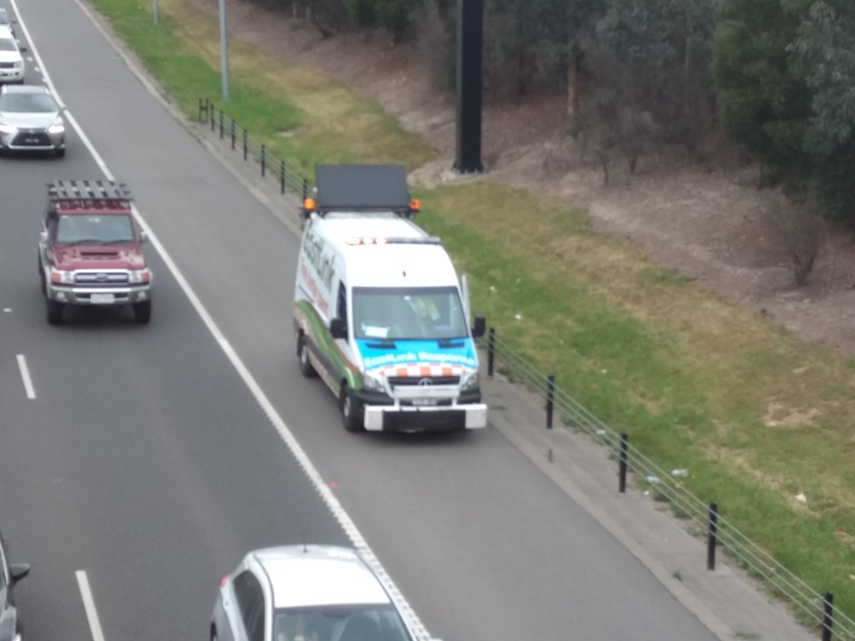 Alan_Cuthbert's tweet photo. EastLink has arrived and trying to decide what to do. He removed a piece of wood from the road but hasn't done anything else! #StopAdani #5Days5Fwys https://t.co/HCezgYGLqk