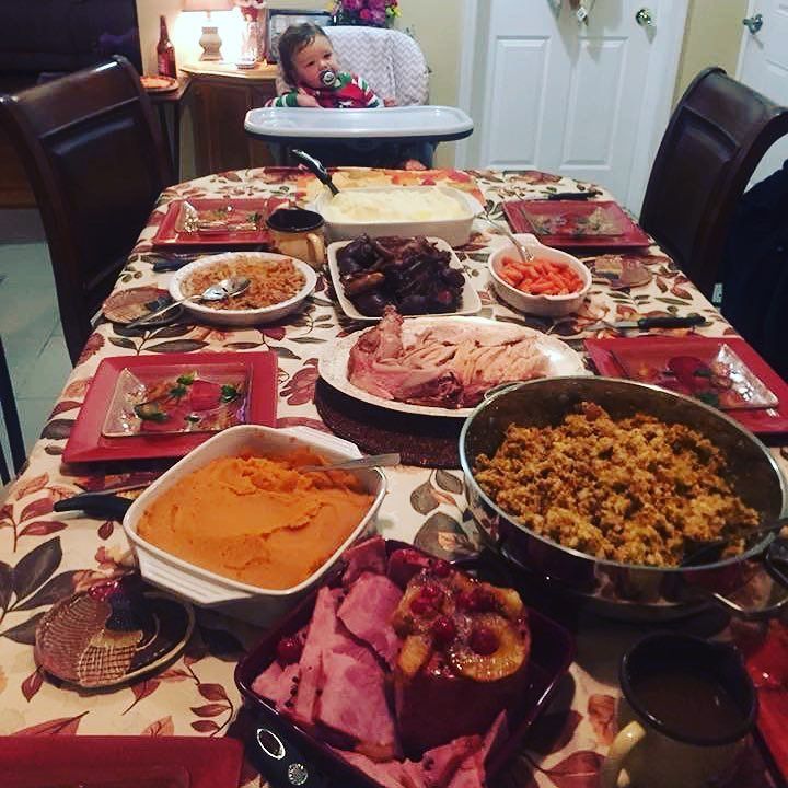 My son about to go to town.  #niceguytours #turkey #roastbeef #ham #mashedpotatoes #yams #bakedcorn #greenbeancasserole #stuffing #honeyglazedcarrots and not pictured #pecanpie #coconutcustardpie #pumpkinpie #cookies #grateful #mycuprunnethover