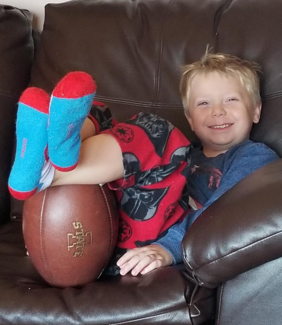 Stepherb2's tweet photo. @CycloneFB this is how one watches football at our house on Turkey day #HappyThanksgiving2017 #bubbalovinit #myfootballboy https://t.co/CptUOMbZYq