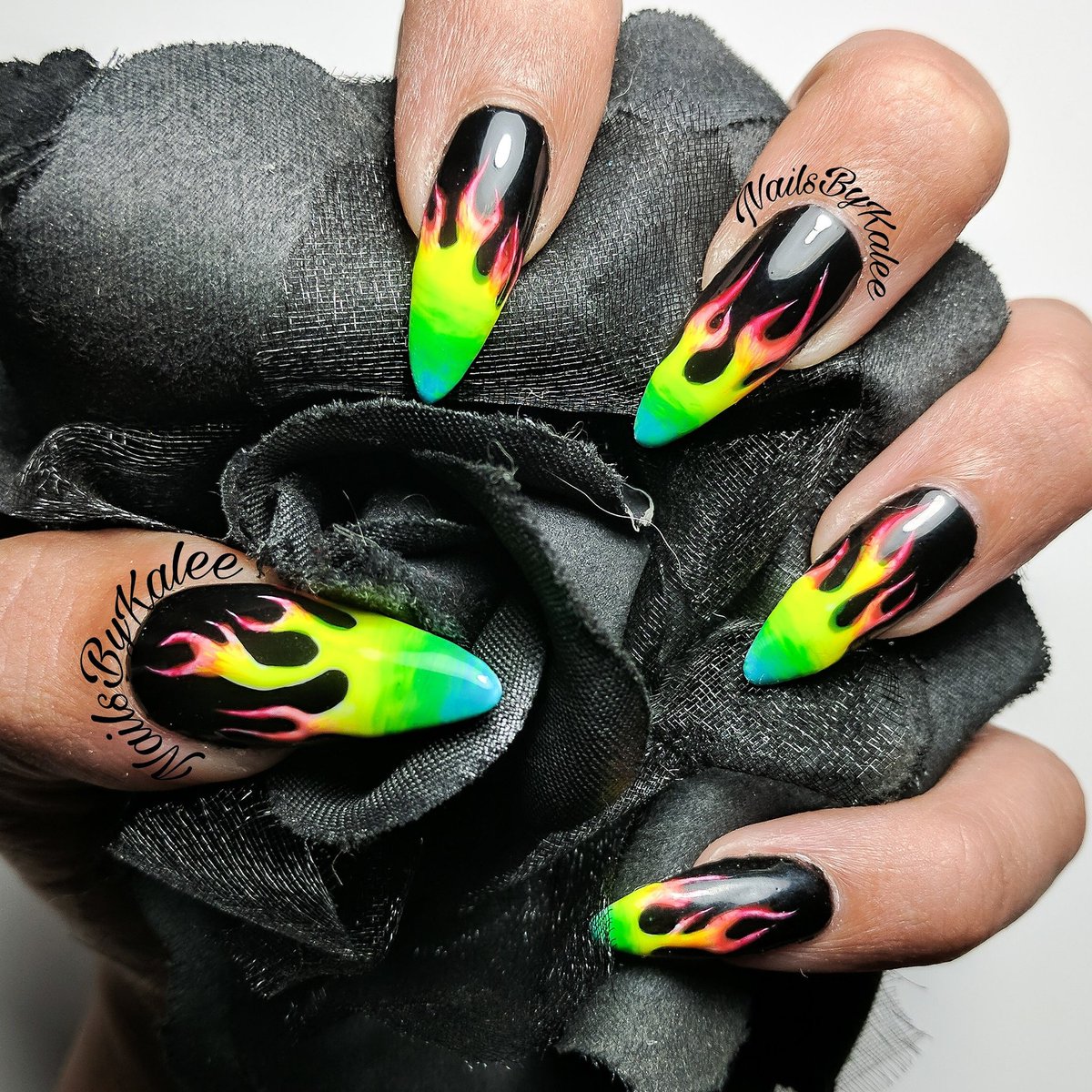 NailsByKalee's tweet photo. Happy Thanksgiving to those who celebrate it. Happy almost Friday to those who don't. Here's my current set, rainbow flames to appease my color craving soul! When in doubt, flame out? #proudlesbian #pride #rainbowflames #rainbownails #nailinspo #nailpro #nailart #nails #nailedit https://t.co/drkSxESbQC