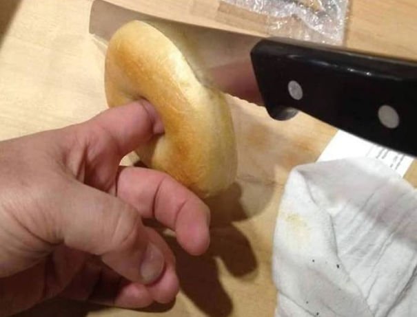 MrContrarian's tweet photo. Top Tip: When cutting bagels in half, put your finger through the stabilisation hole to keep it steady https://t.co/wqxTWTVoy1