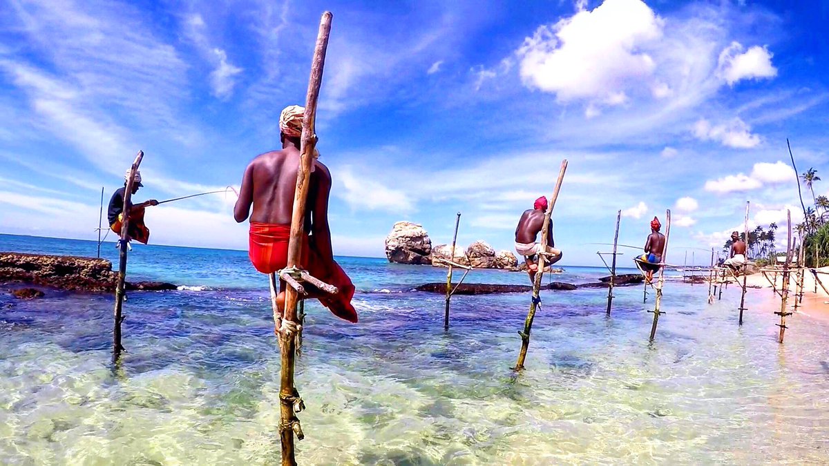 TiptoeingDWorld's tweet photo. Stilt fisherman in Koggala, #SriLanka #beach #travel #travelblogger #familytravel #blogging #autism #autismawareness #asd #tiptoeingtheworld https://t.co/V5szFt7aLz