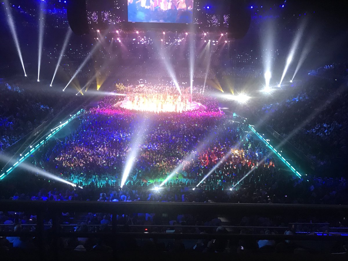 dizdarm's tweet photo. Phenomenal talent - over 5,000 students light up Homebush! Well done to all involved! #ownthemoment https://t.co/85hHoQX3vE