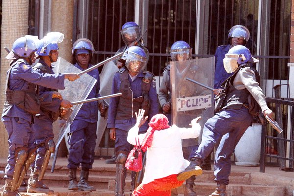 PhilMphela's tweet photo. Come January Zimbabweans must say #NeverAgain with their votes for people like Lillian Chinyerere Shumba — a 63 year old woman who was brutally attacked by Mugabe's goons in September 2016. This is ZANU-PF's legacy!!
#MugabeHasFallen #MnangagwaInauguration https://t.co/bhuhjJ21ji