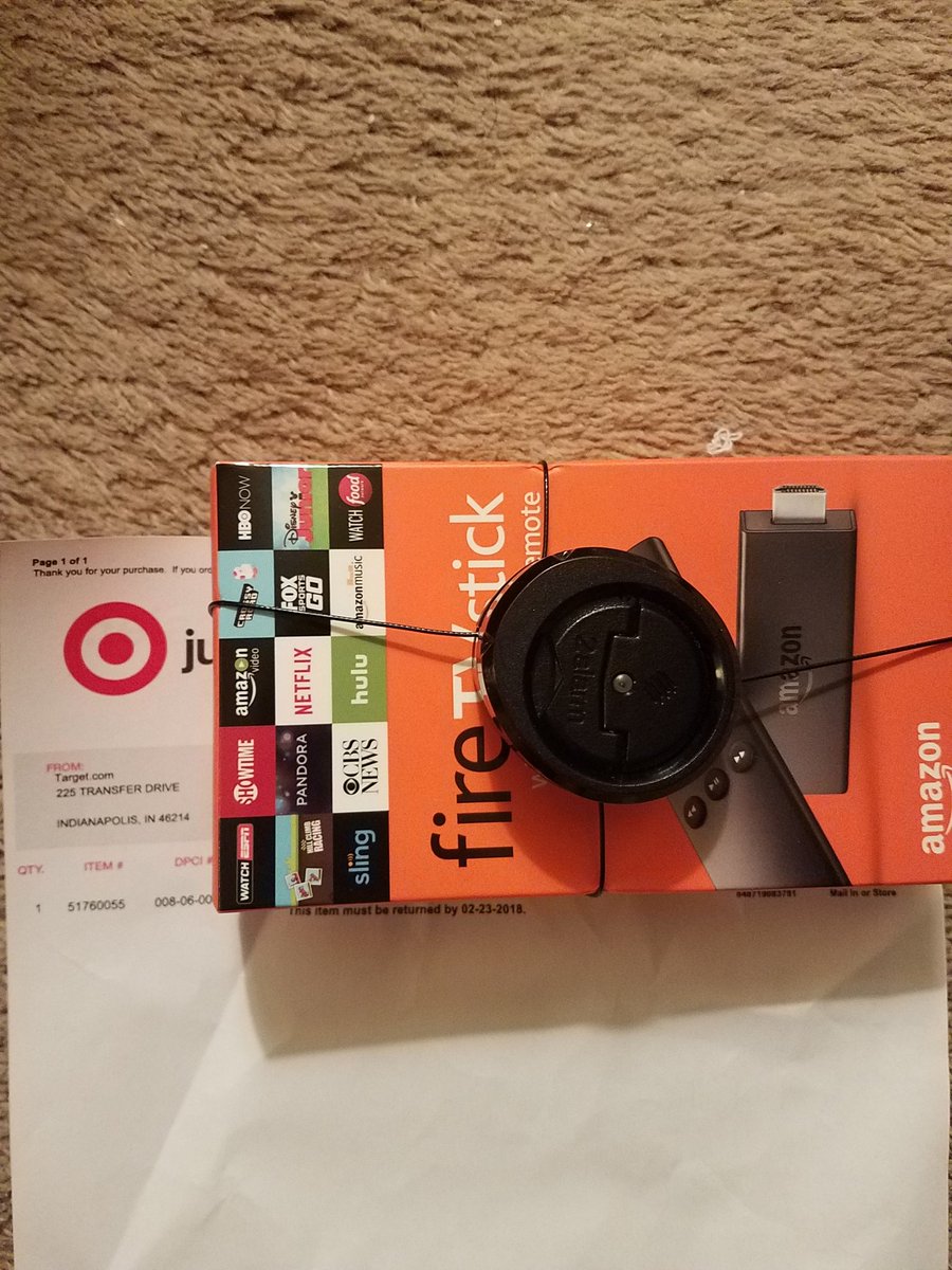 DezSlade's tweet photo. @Target I bought from the website but my fire stick came with a security device still attached. Now I'm stuck going to the store to get this thing off. https://t.co/iohStCXKxv
