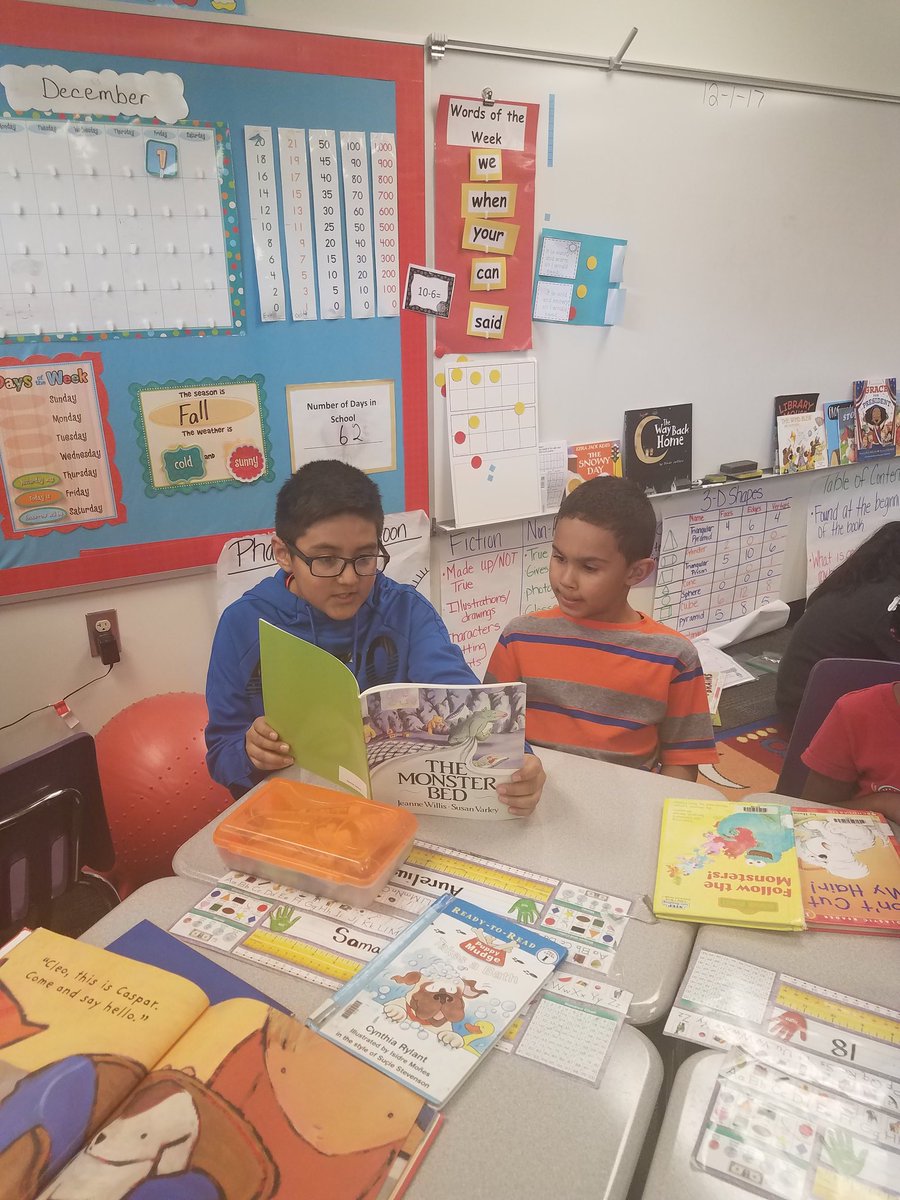 SunflowerElem's tweet image. Book buddies make reading fun!  Ms. Schmidt's fourth graders love reading to our first graders.