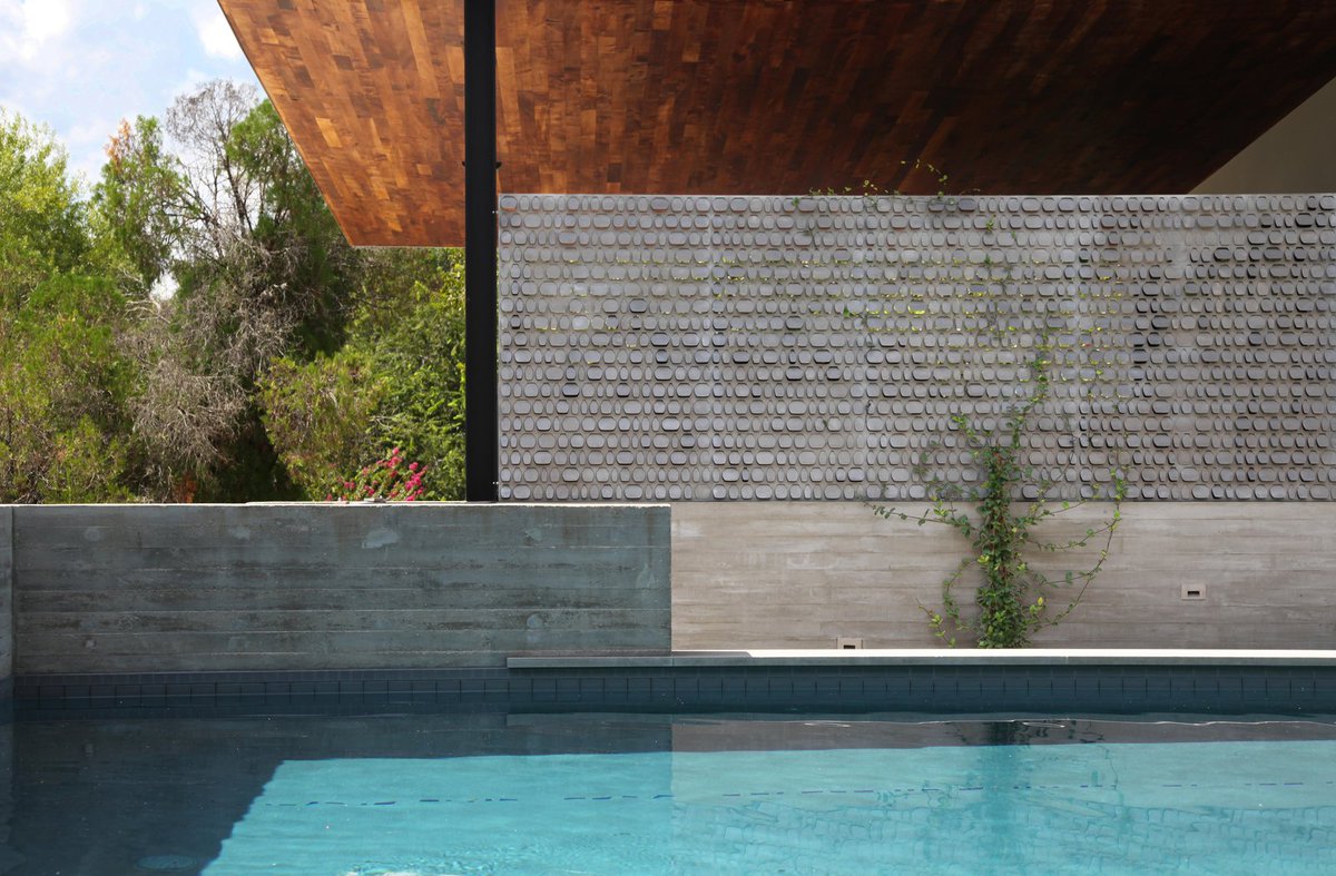 ShortRunPro's tweet image. These custom shutters are a great example of style and utility combined. dwell.com/article/beside…