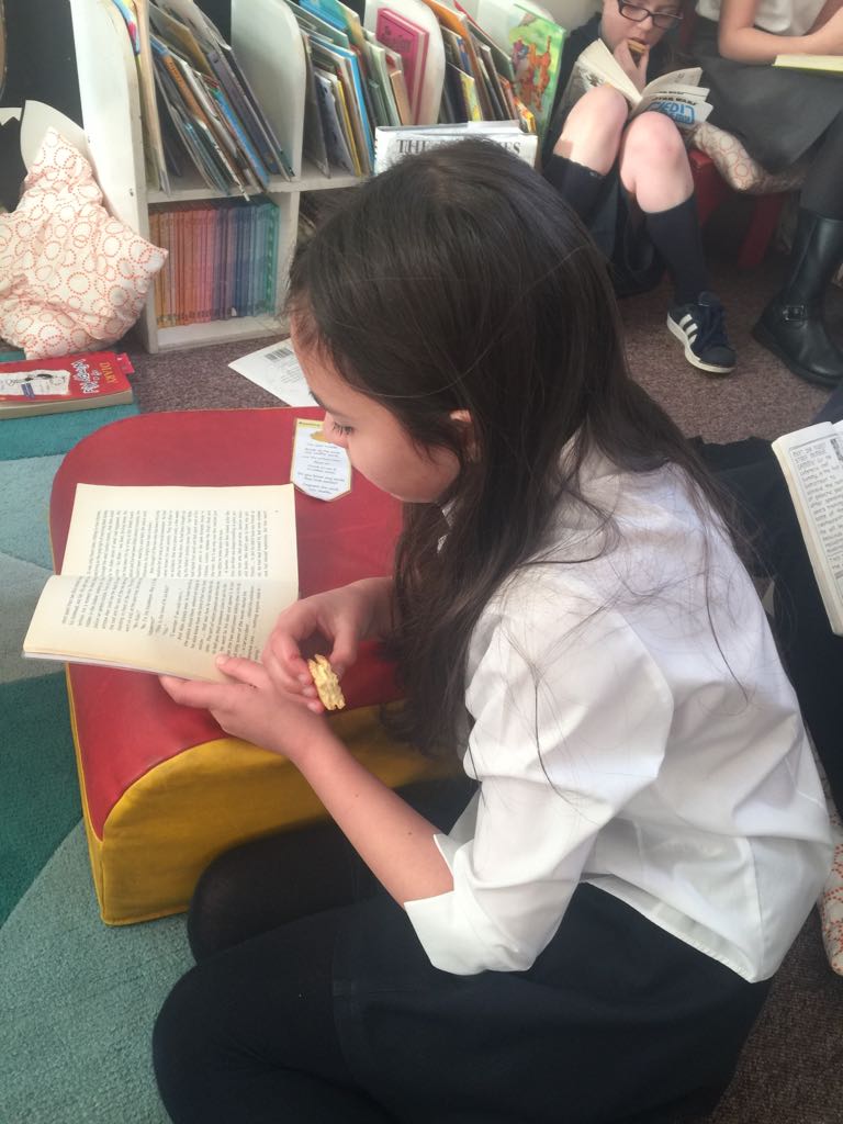 WBurghPrimary's tweet photo. P6 enjoying a biscuit and a good read in our fabulous library. #BookWeekScot #WillybugsRead https://t.co/A8yB4O5hMX