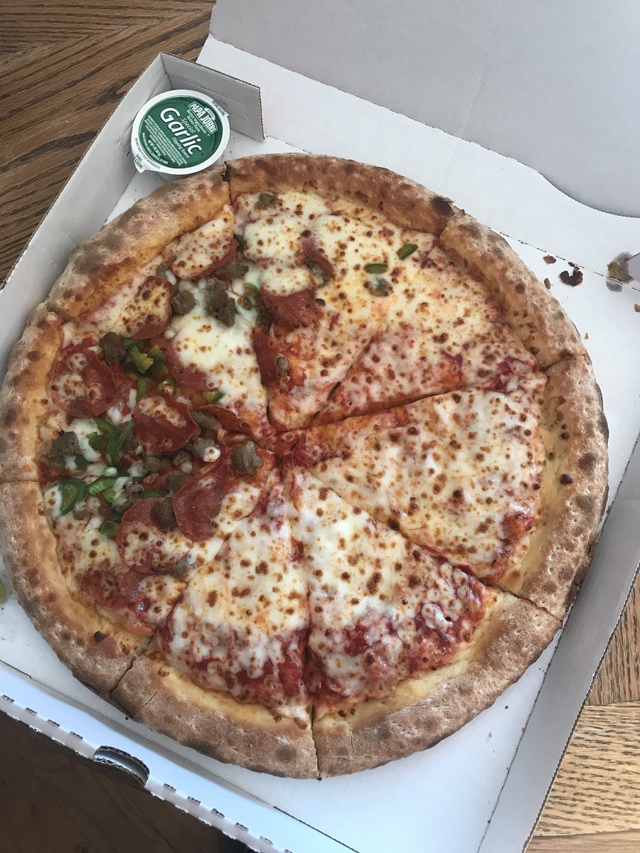 aaron_lepley's tweet photo. wow @PapaJohns. this pizza doesn’t live up to your evenly spaced toppings claim. half cheese, half pepperoni sausage peppers onions and jalapeños. not impressed. https://t.co/7hMfkhYz0S