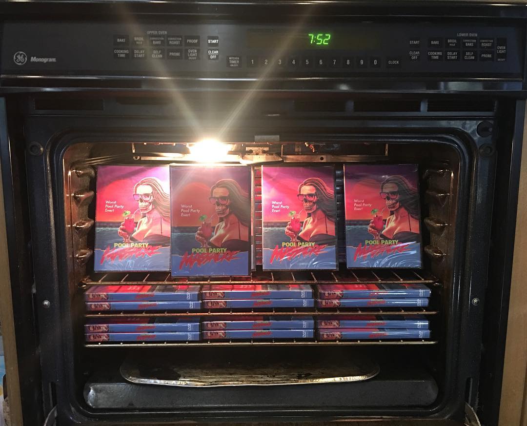 PoolMassacre's tweet photo. We have so many extra Pool Party DVDs laying around that we ran out of places to keep them. (seriously) Thats why we are selling DVD's for only $5 until this damn oven is empty and we can finally cook our turkey. Check it out. https://t.co/mxnx3vENTZ https://t.co/8irA2y1AkJ