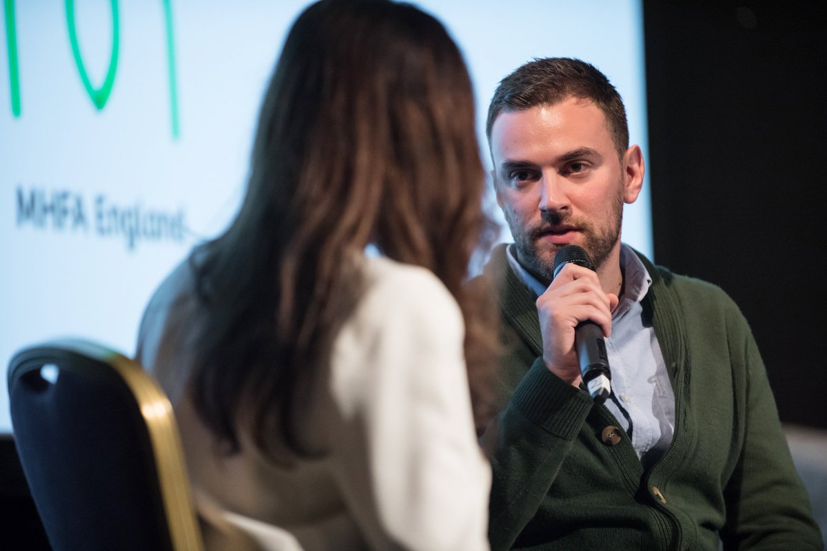 MHFAEngland's tweet photo. A really special moment at our #10YearsofMHFA event was being joined by @MrJonnyBenjamin and @neillaybourn who shared their moving story with us, spreading the message that talking about #MentalHealth can have a real impact. Thank you both for joining us! https://t.co/IGflBBzd0W