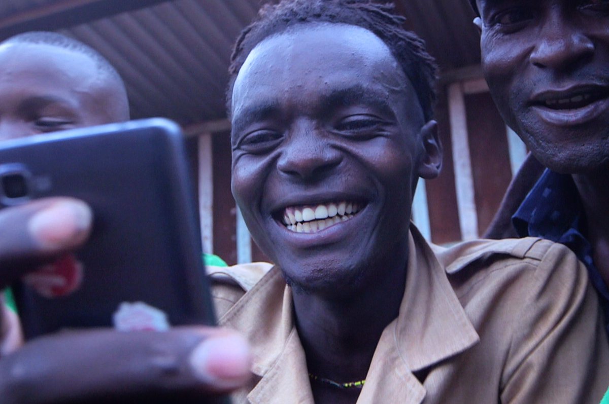 Ubuntu_Power's tweet photo. Our town’s Casanova getting some inspiration on how to best start the weekend. All thanks to the community Wi-Fi that we are providing! #ubuntupower #solarpower #offgrid #minigrid #renewableenergy #kenya https://t.co/ZokHXmft1w