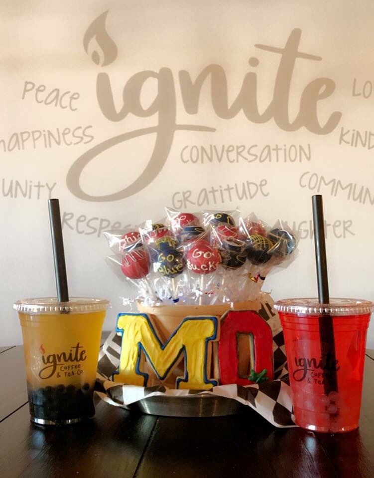 IgniteCTC's tweet photo. Come in tomorrow and show your support for YOUR team! We have cookies, cake pops, and even special Burst Teas for THE game. For one day only, we are featuring the Maize and Blue (peach tea with blueberry bursts), as well as the Scarlet and Grey (raspberry tea with lychee bursts). https://t.co/LDHAlb7oCN