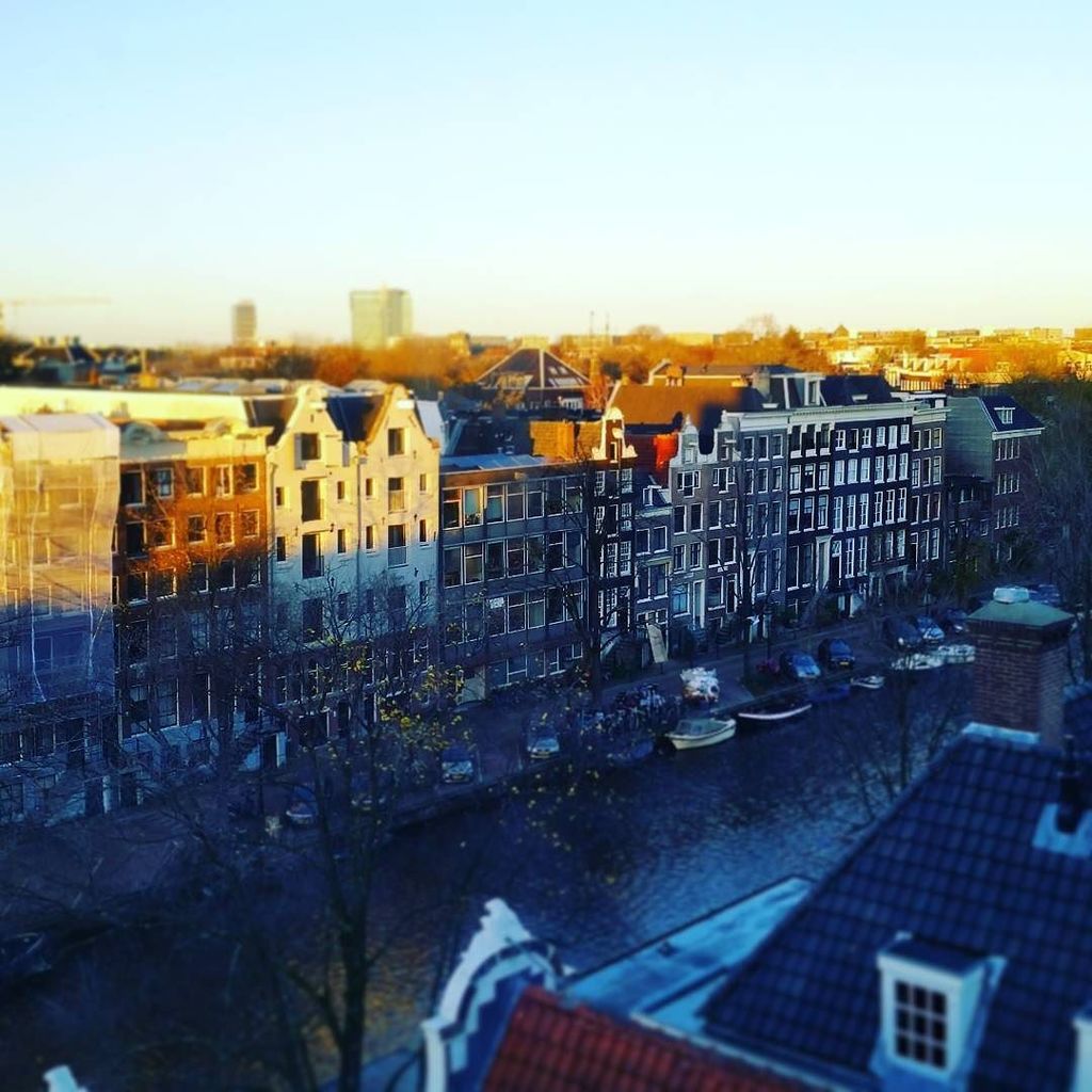 QueerlyNomadic's tweet photo. Happy Friday! This is the view at 4pm from Jones' coworking space here in Amsterdam. The sun goes down early, but we've been keeping busy with all kinds of adventures + our usual work stuff!

#tgif #amsterdam #coworking #wework #workremotely #remotework … https://t.co/d3sOHmI9jO https://t.co/uKyJ5aNhmT