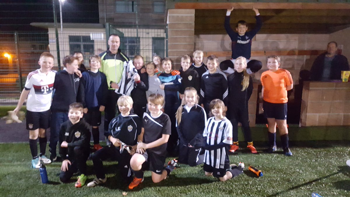 SomertonTownYFC's tweet photo. Good luck to our out going manager AL Cunningham on your new life down under .The team presented him with a signed shirt at his last training session tonight..the club will be a poorer place without Al and his families help and commitment.
#blackandwhitearmy
#GoodluckAL https://t.co/aitEHUWQ6M