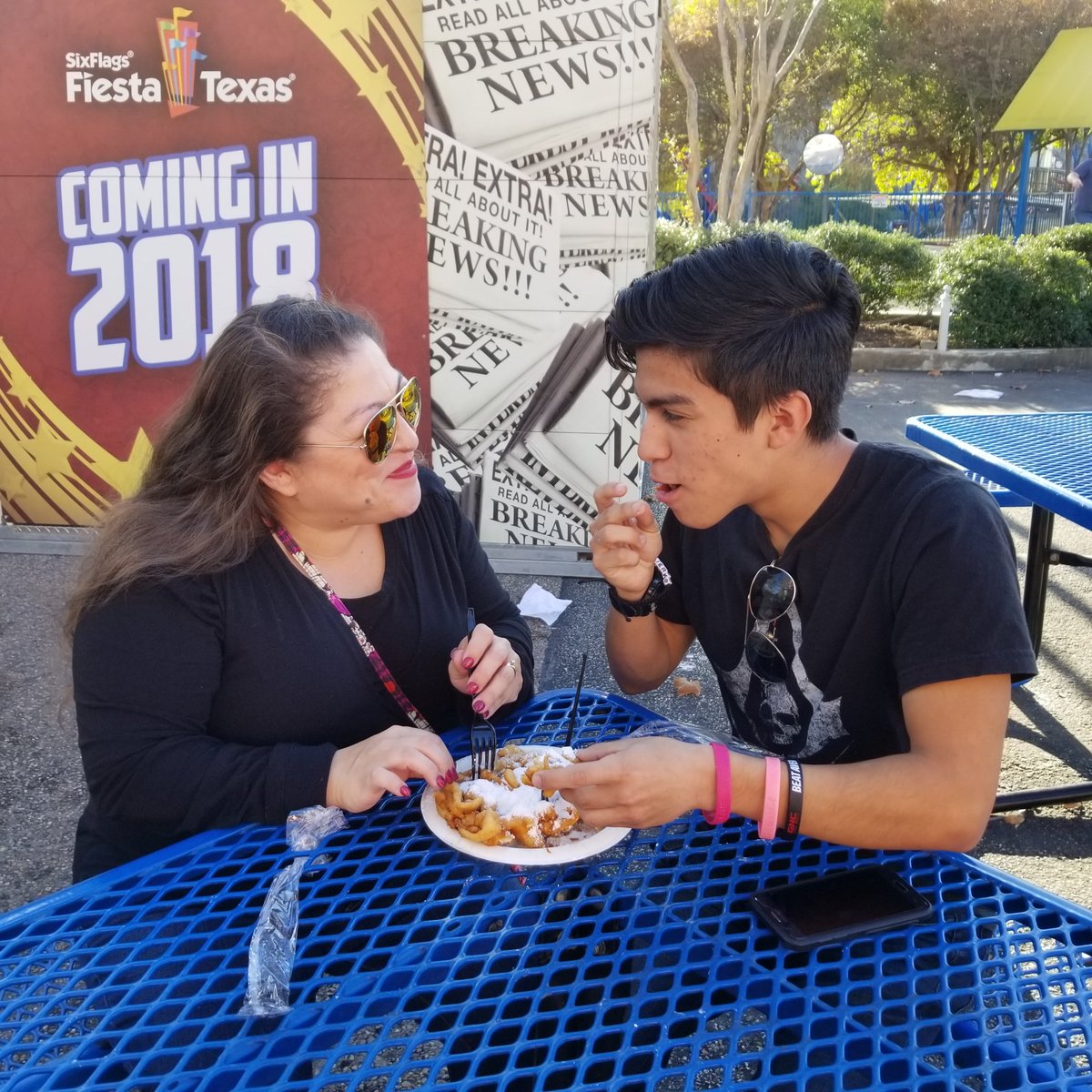 LElizaG_LFU's tweet photo. What happens when you make 2 sweet tooths (teeth?) share 1 funnel cake? #sweettoothshowdown #funnelcakewars #sixflagsfiestatexas https://t.co/eVk3RhCHth