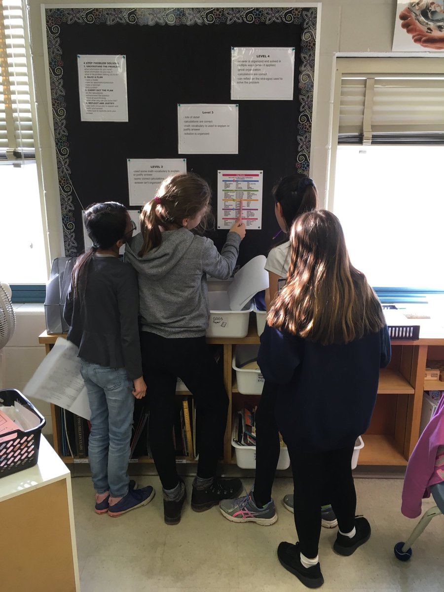 da_vasey's tweet image. We are learning to pick out key words to understand word problems in math. Here some students got up on their own to use the Math Learning Board for reference💕#thirdteacher #learningboard #weareddsb
