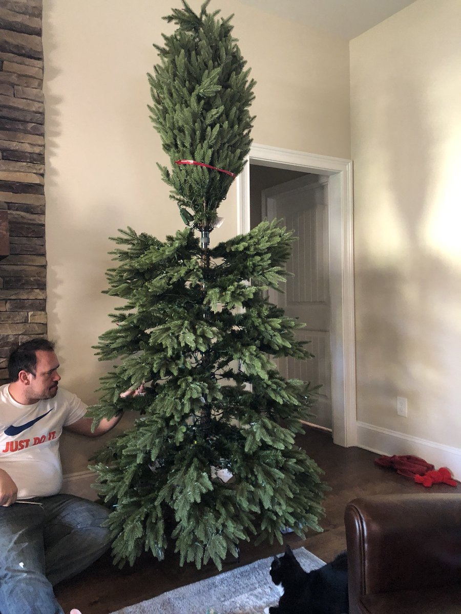 jrmoore13's tweet photo. my husband trying to fix my brand new @balsamhill tree that won’t light.    Said it will be up to 10 more days before I get a new one 😭 https://t.co/hEs975SYkG