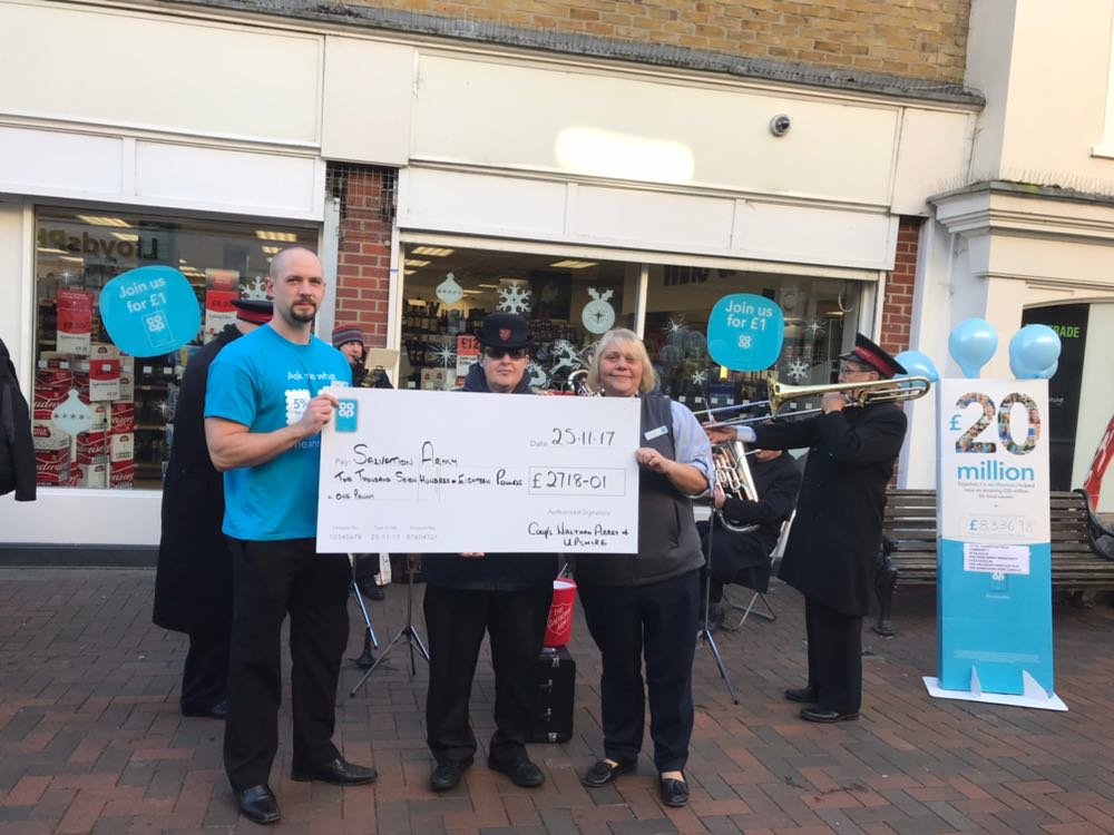 Coop Waltham Abbey, handing over a well deserved check , to the Salvation army.